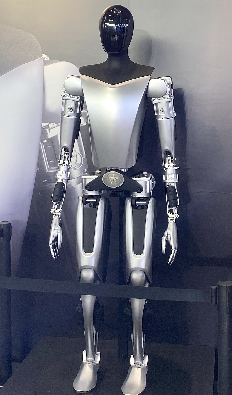 Earlier Tesla Optimus on public display, 2023 — not V3 production line